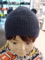 Cappello neonato Teja Cappello per neonato con orecchie in caldissimo filato a maglia rasata di lana/viscosa/casmere, fodera in cotone.