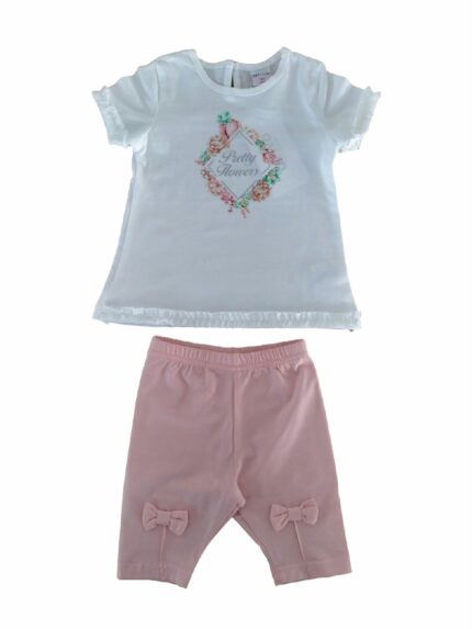 Completo Cerimonia a Pois Ativo Kids Completo in cotone per bimba composto da: t.shirt stampata girocollo a maniche corte bordate da rouche in tulle e rouche in tulle sul fondo + leggings con elastico in vita e applicazione di fiocchi sul davanti.