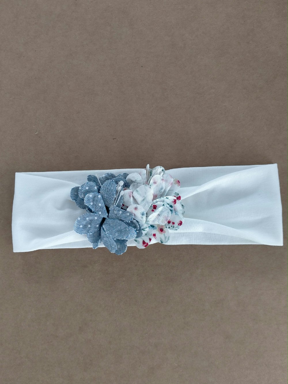 Fascia jersey Fiorellini FA4740 00 Fascia jersey Fiorellini Fascia in jersey di cotone con decorio fiorellini multicolor in tessuto. Made in Italy