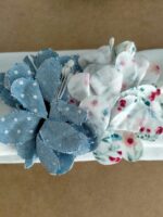 Fascia jersey Fiorellini Fascia in jersey di cotone con decorio fiorellini multicolor in tessuto. Made in Italy