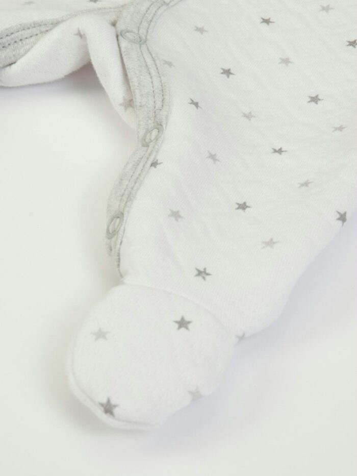 Tutina neonata Tutina 100% cotone per neonata con piedini, apertura davanti e al cavallo con bottoncini snap.