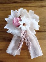 Abito Ametista Mimilù Abito da cerimonia in organza per damigella e prima comunione. Modello smanicato dal taglio morbido con corpetto ricamato e ampia gonna con tripla balza in organza e tulle, cintura fiorata removibile tono su tono, sottogonna in tulle. Abito da Cerimonia Ragazza Abito da Cerimonia Bambina Abito Damigella Abito Prima Comunione