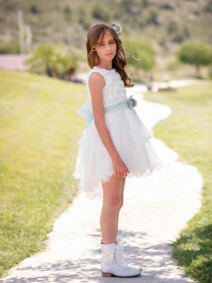 Acconciatura Turchese Mimilù Elegante acconciatura, per bimba e ragazza, in pizzo con fiore in tessuto da abbinare agli abiti da cerimonia Turchese. Accessori Cerimonia