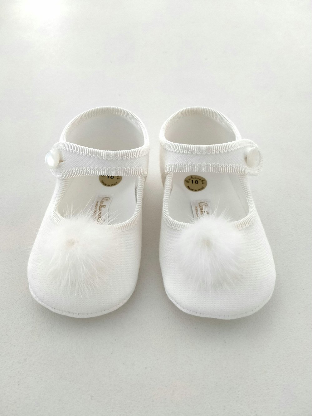 Ballerine culla neonata SF3831/T01038 Accessori Cerimonia Idea Regalo 00 Ballerine culla neonata Graziose ballerine culla per neonata con decoro pompon, cinturino con bottoncino. Made in Italy Accessori Cerimonia Idea Regalo