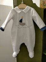 Tutina neonato Vela Tutina per neonato con piedini, maniche lunghe con polsini a contrastoi, modello tinta unita con colletto fantasia e decoro con patch applicate. Made in Italy Lista Nascita Corredino